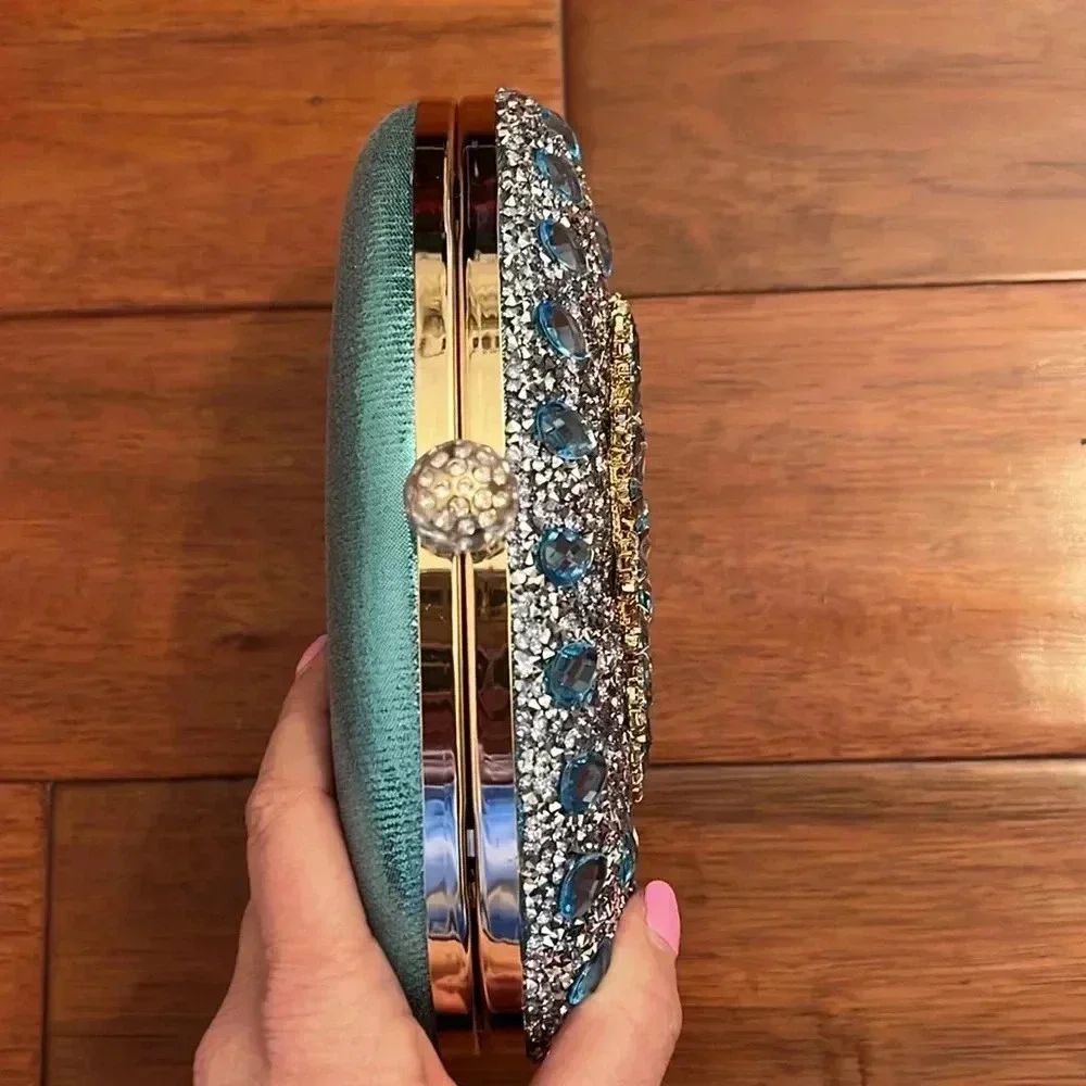Ramla Aquamarine blue Jeweled bag with removable handles
